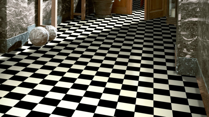 Laminate flooring which can provide a patterned style to suit each home. This looks like a chessboard.