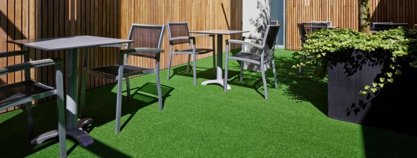 Picture of artificial grass in a conservatory.
