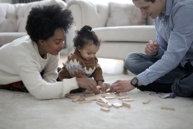 Family on a warm carpet
