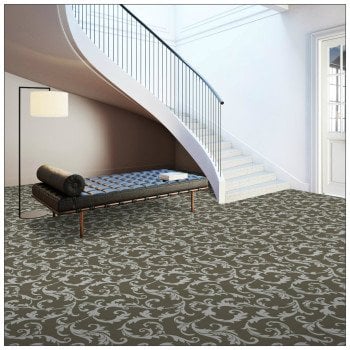 A patterned carpet with a staircase. 